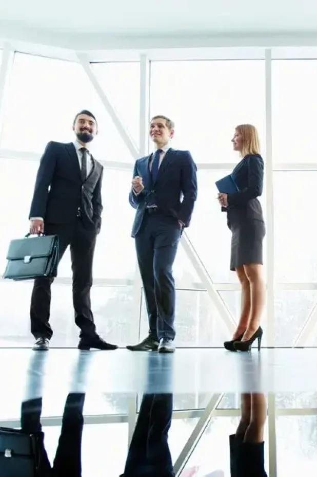 Business professionals and digital world map – Lotse global network